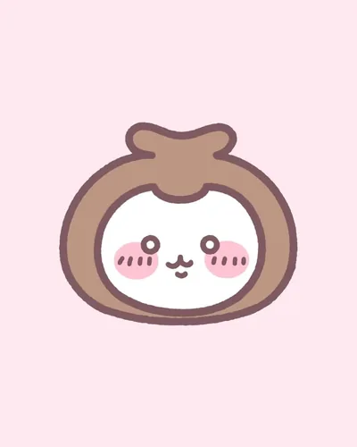戴著棕色零錢包造型頭套微笑的吉伊卡哇LINE頭像